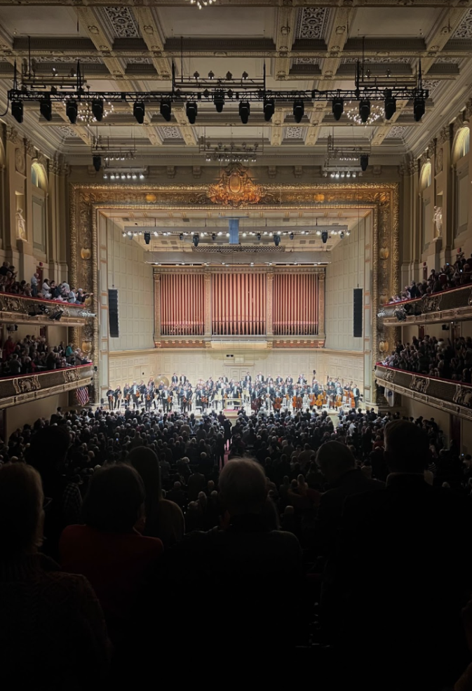 Audience clapping for the Boston Symphony Orchestra after their performance. 